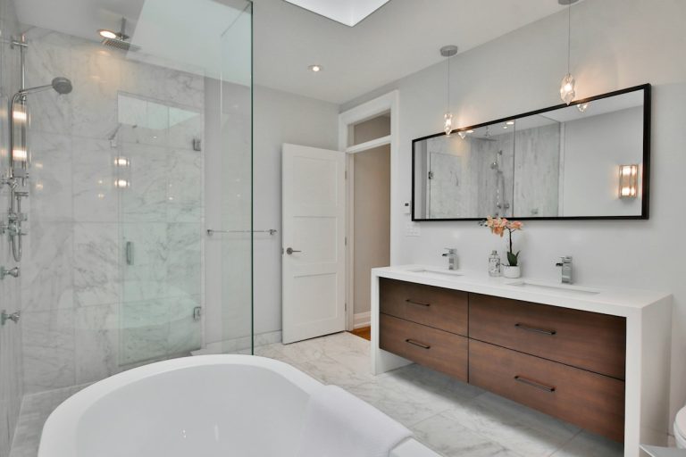 Remodeled bathroom with a freestanding tub and walk-in shower