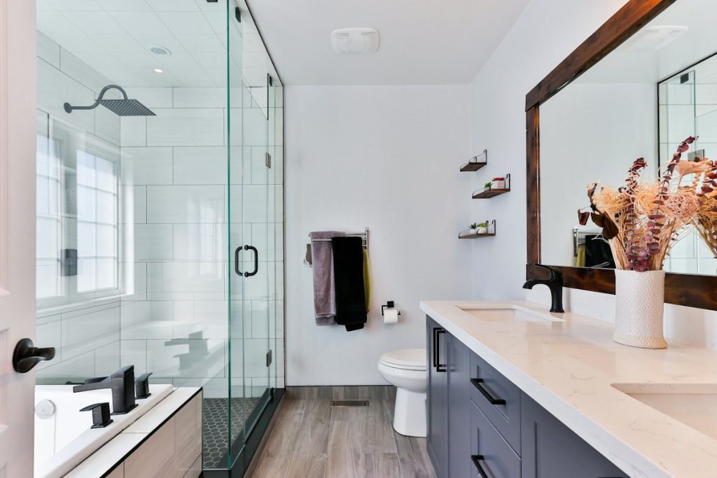 Shower with glass door replacing a bathtub layout