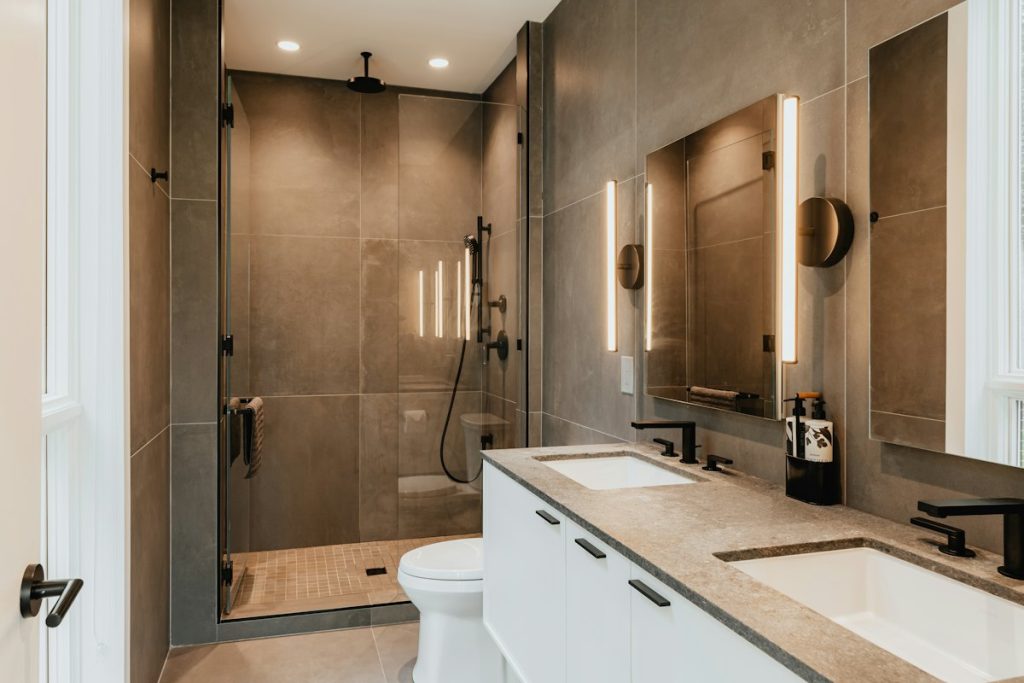 Walk-in shower beside a modern vanity